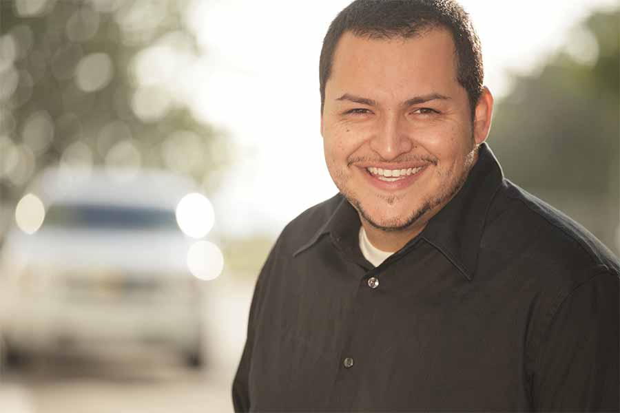 Matthew smiling - now he has a new life because of your online recurring donations.